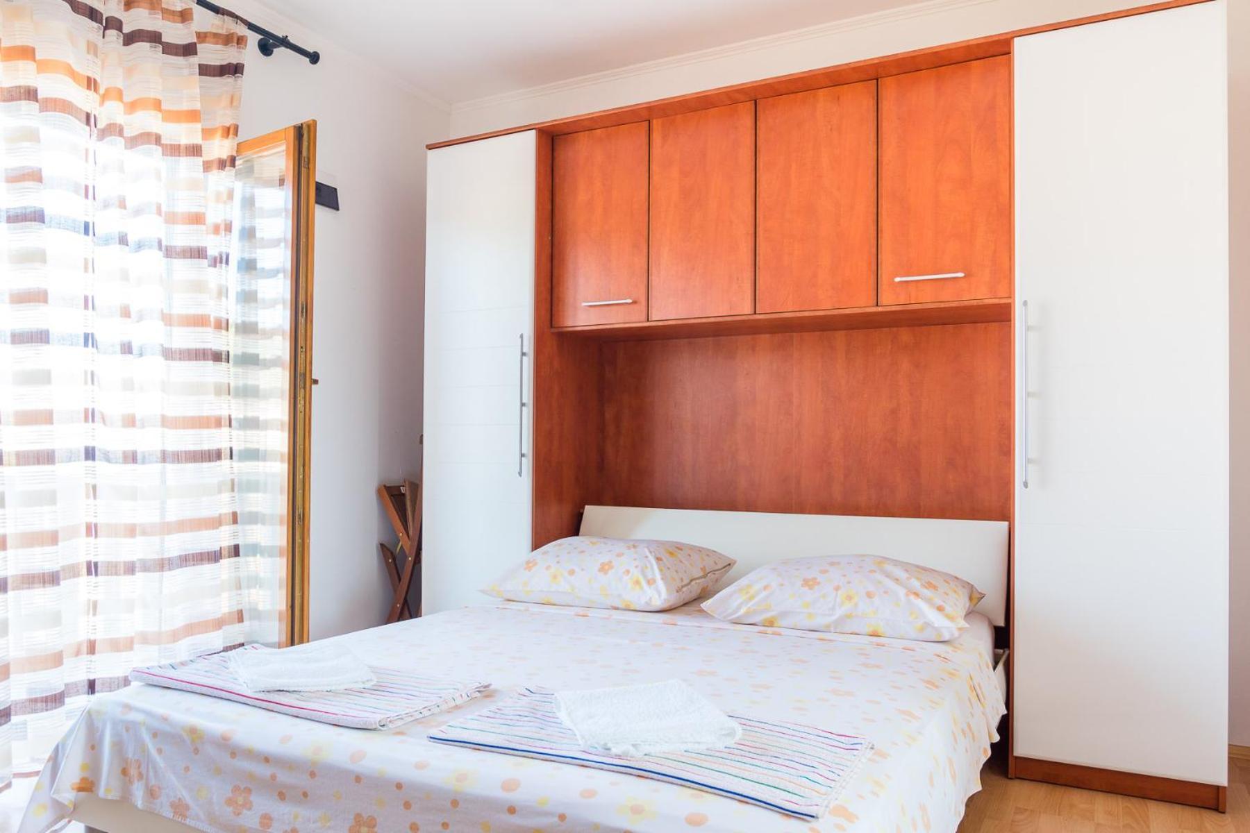 Apartmani Fides Lumbarda Bilik gambar